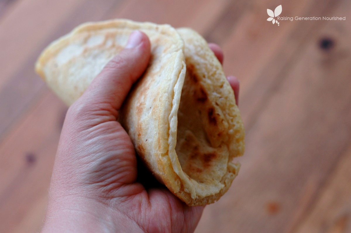 Gluten Free Pita Bread :: Flexible & soft, yet sturdy enough to stuff with your favorite ingredients! This pita tastes just like bread without gluten or xanthan gum!