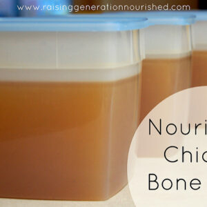 Chicken bone broth in containers for freezing