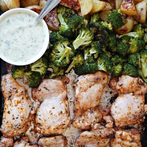 Sheet Pan Lemon Garlic Chicken, Potatoes, & Broccoli with Dairy Free "Cheesy" Herb Sauce